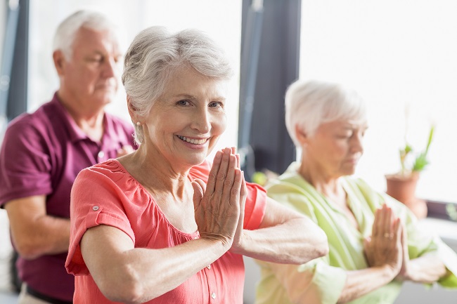 8 Ways Yoga May Help Caregivers and People with Alzheimer's Disease